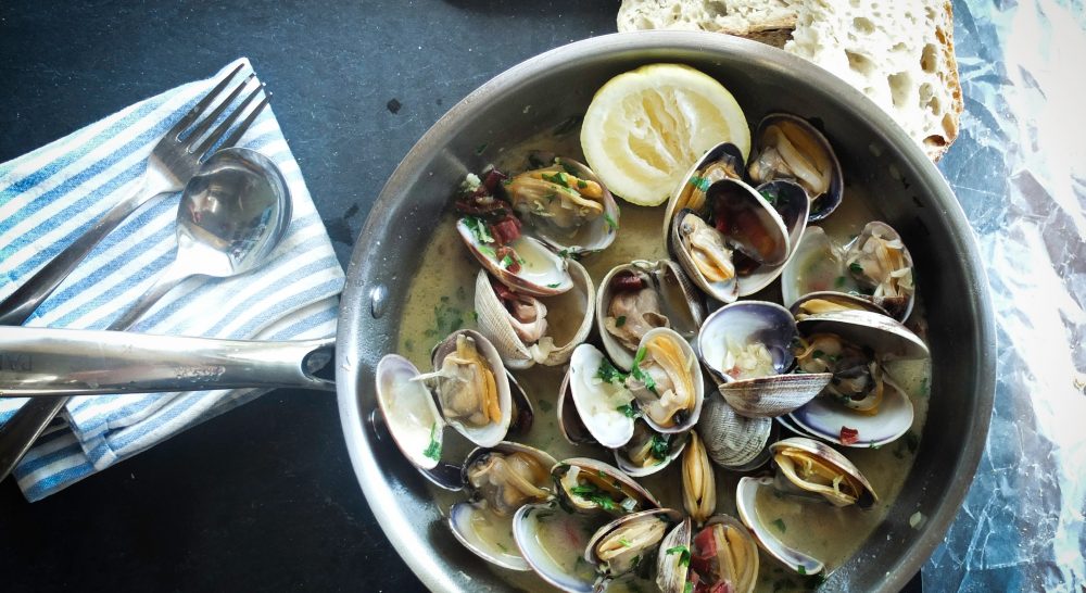 mussels and clams in a bowl. Seafood is one of the favourite dishes on the Algarve. Why not explore all of the top Vale Do Lobo restaurant picks and experience a taste of the Algarve.