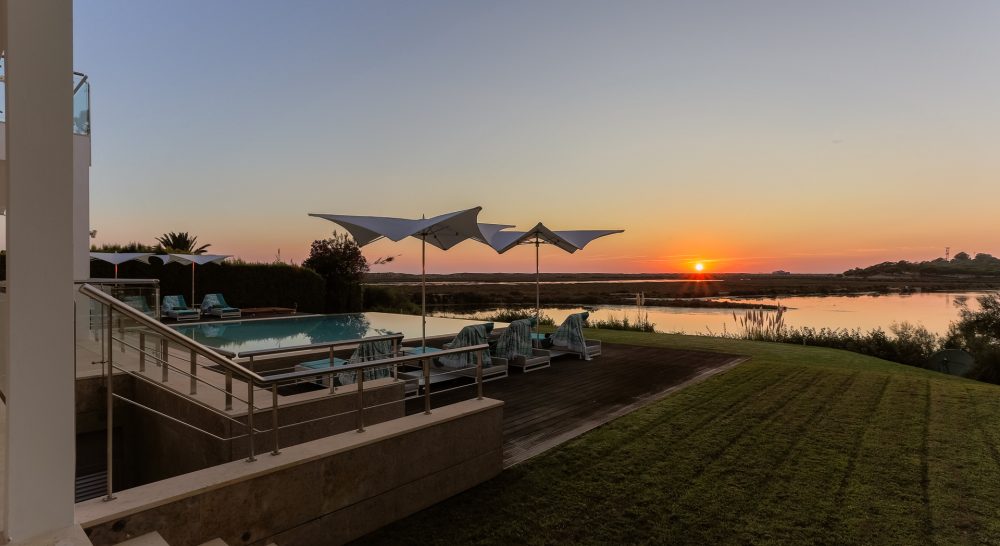 algarve sunset with sun loungers