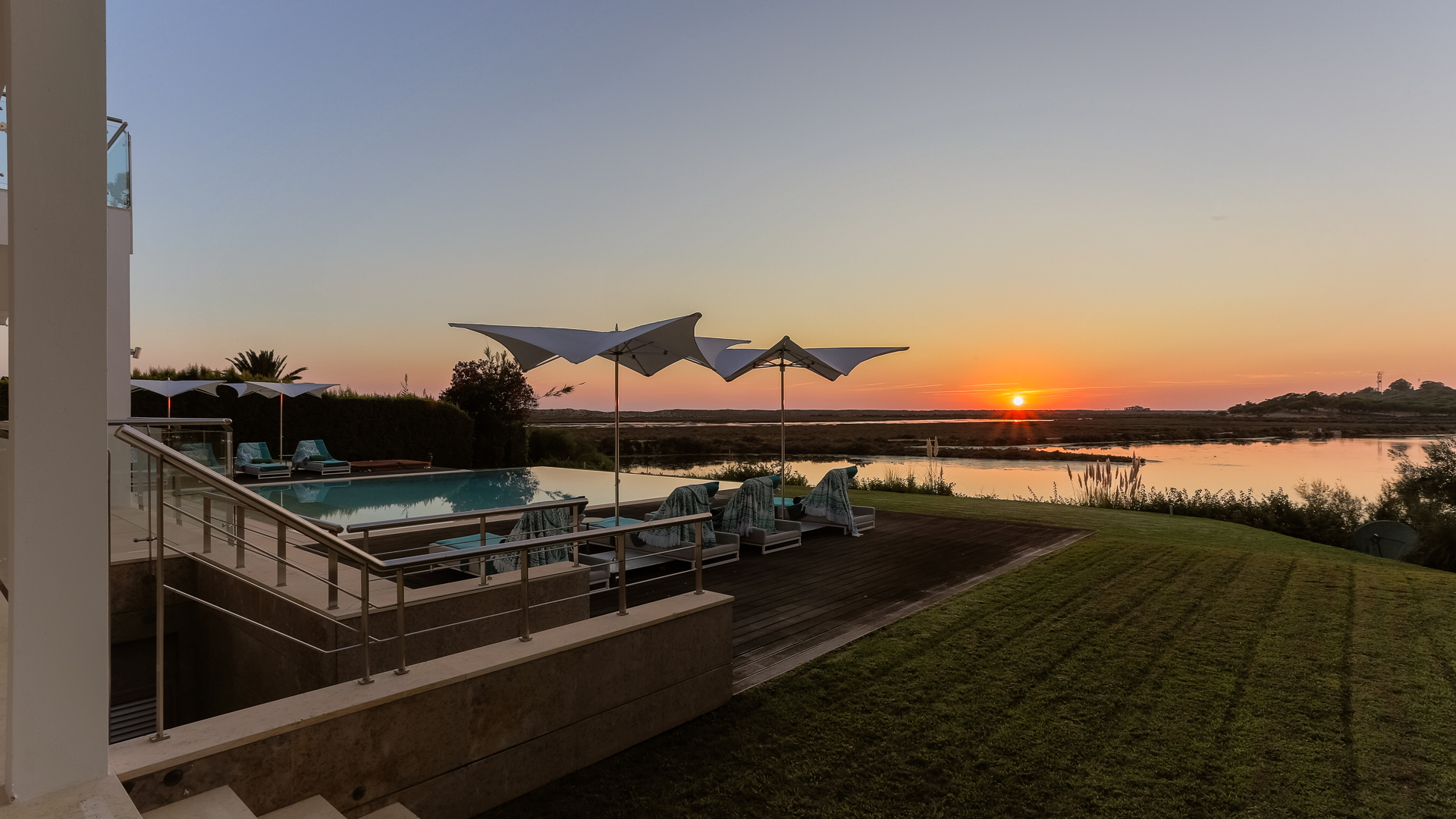 algarve sunset with sun loungers