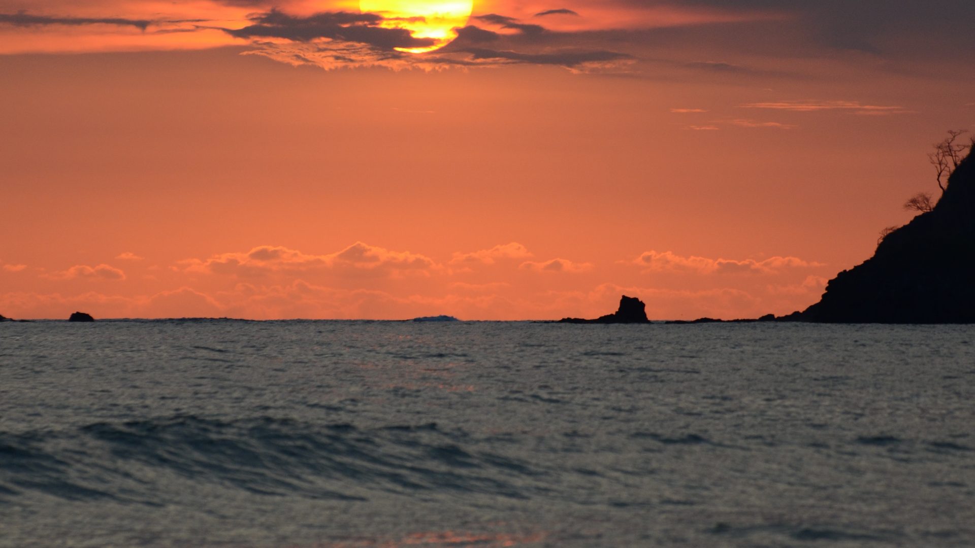 orange and yellow sunset over the sea