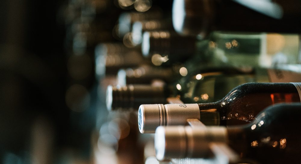 bottles of Portuguese wines stacked up